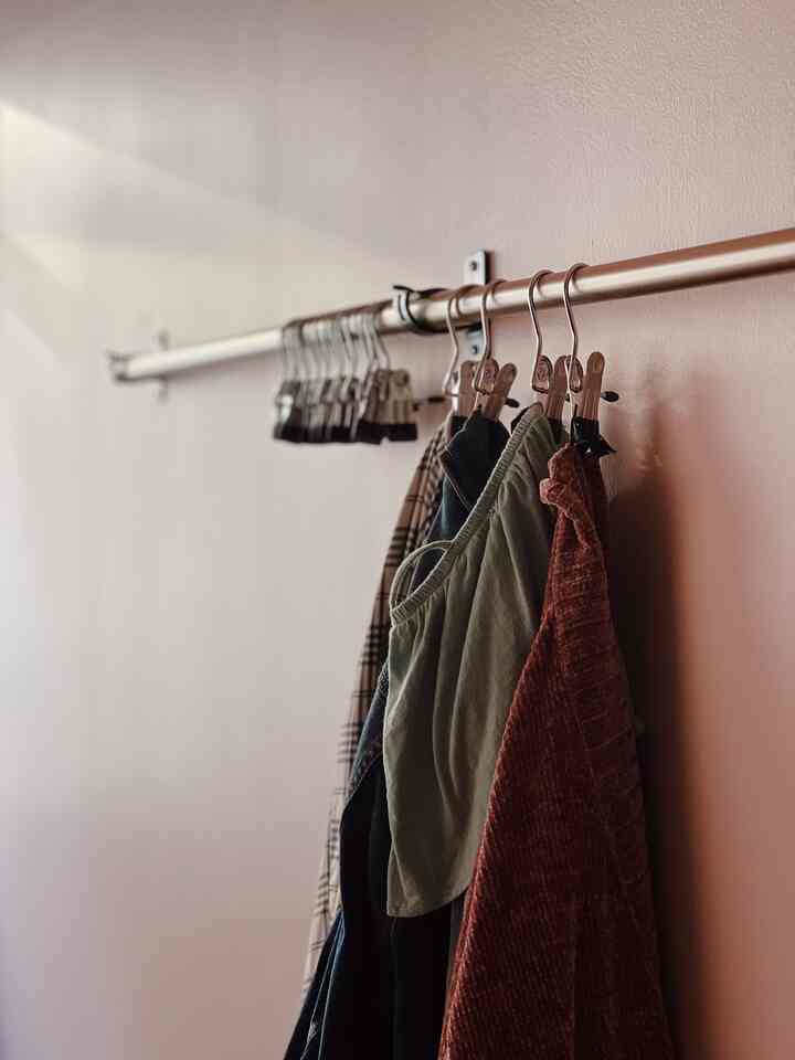 Hanging up clothes that are worn but can be worn again like this has been a game changer! No more pile of clothes on a chair!

#organized #Organizingclothes #laundry #clotheschair #modern #brass