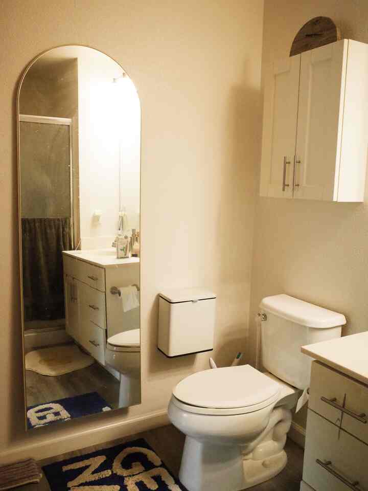 More floating magic! ✨ I mounted a full-length mirror and even the trash can—keeping the floor clear and making cleaning a breeze. Small space living = smart space saving! 🙌 #SmallSpaceHacks #FloatingEverything #EasyCleaning