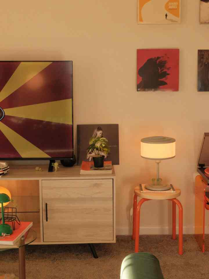 Organization tips & tricks:
Lots of emphasis on the TV stand but look at how well it hides all the cables and wires :) it truly makes the viewing experience that much more enjoyable!

Featuring clean lines and fun home decor shapes :) 🫶🏼

#warmhouse #orangehues #lampcollection