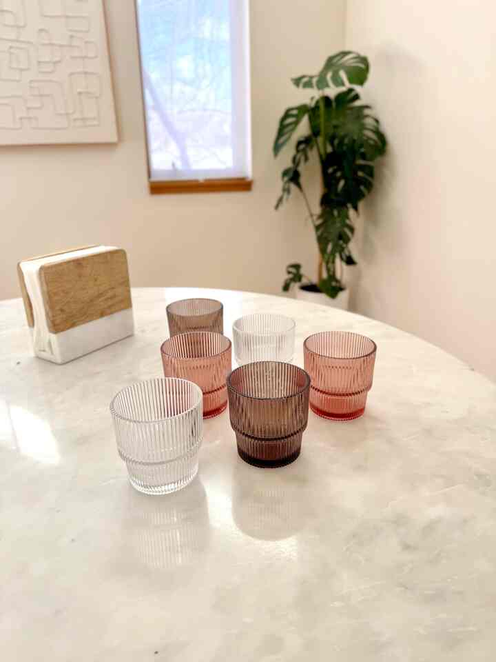 Bought new glasses in color. So pretty.🤍🤎🩷 
Tip✍🏻 Buy the stackable glasses to save spaces in the cabinet!
#glasses #glassware #marble #marblediningtable #nero #marbletable #modern #natural #diningrable 