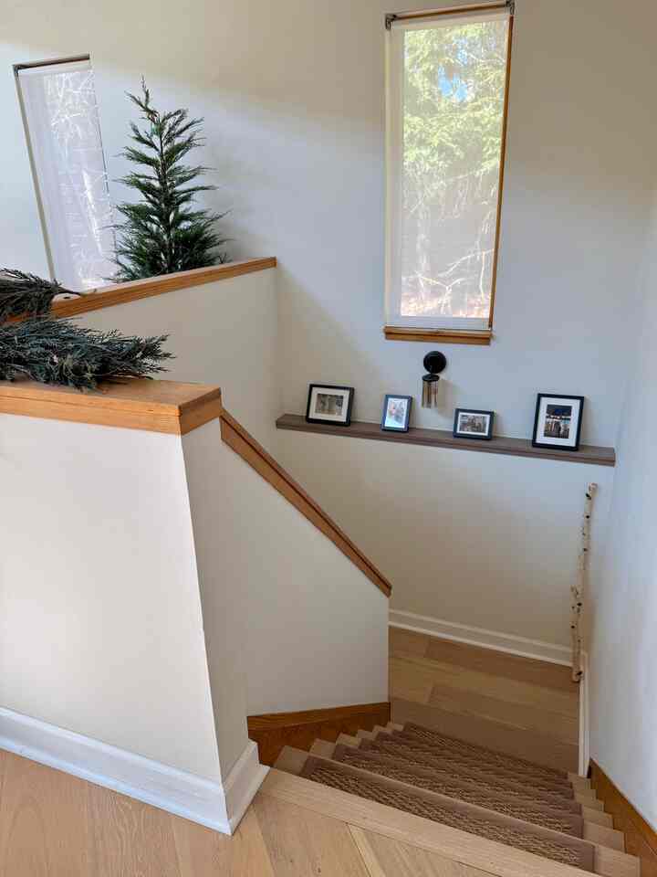 View of the stairs leading to the basement.
#stairs #modern #warm #cozy #hallway #enterance 