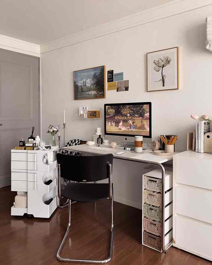 White and brown toned home office space featuring iMac and neat storage units with modern study interior