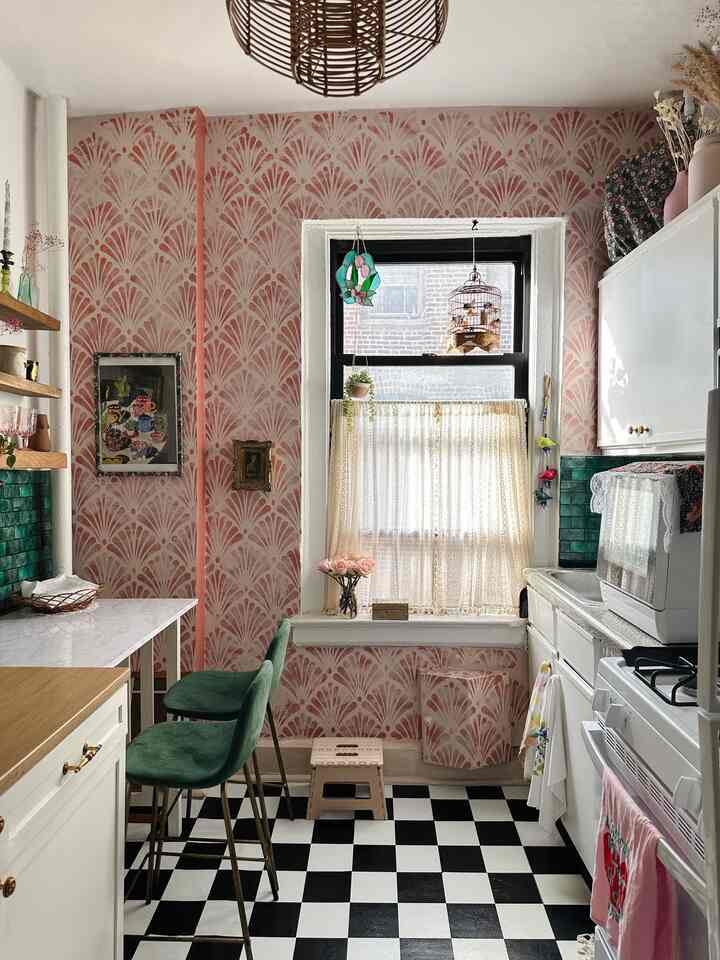 I put so much love and hard work into my kitchen! I redid the floors and stenciled the accent wall￼. I also added half of the cabinets 🥲 it’s come SO far since I moved in! #colorful  #maximalist #kitcheninterior #cozy #eclectic