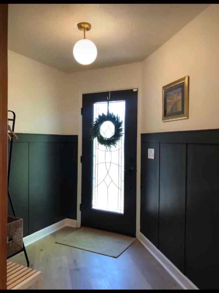 This is the view when my guests arrive at our house. I chose gold accents to complement the black room that I painted. 
#enterance #modern #gold