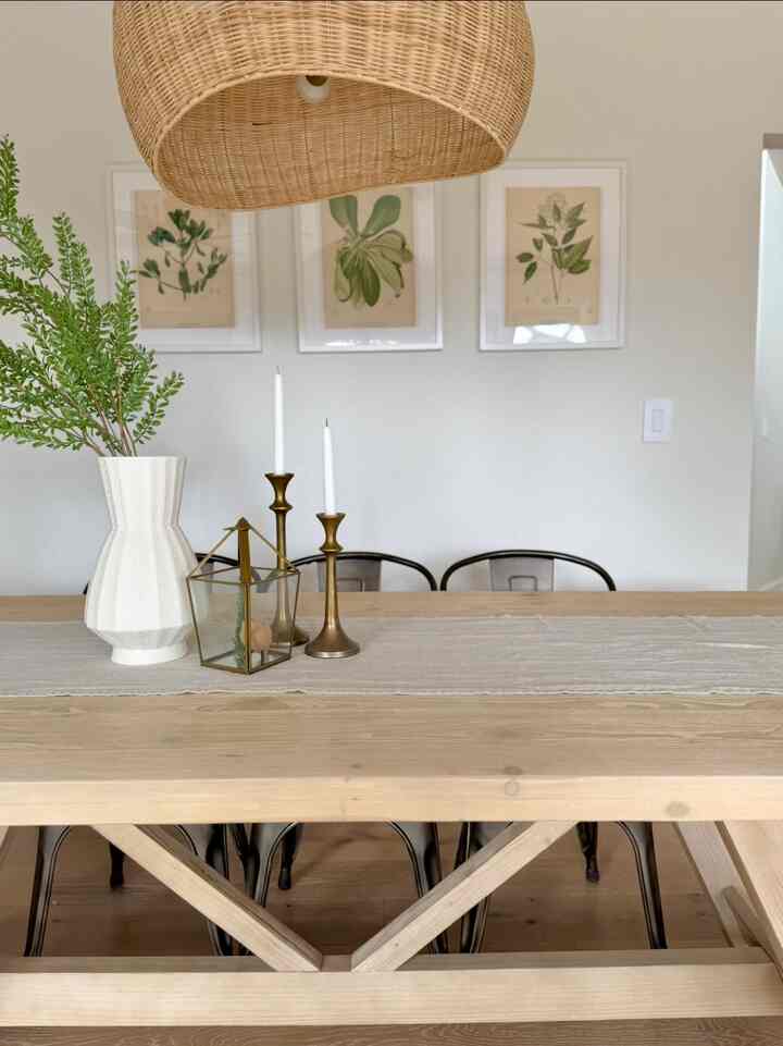 My favorite room in my house is this. #dining #diningtable #wood #wicker #lighting #woodtable #natural #modern #warm #cozy 