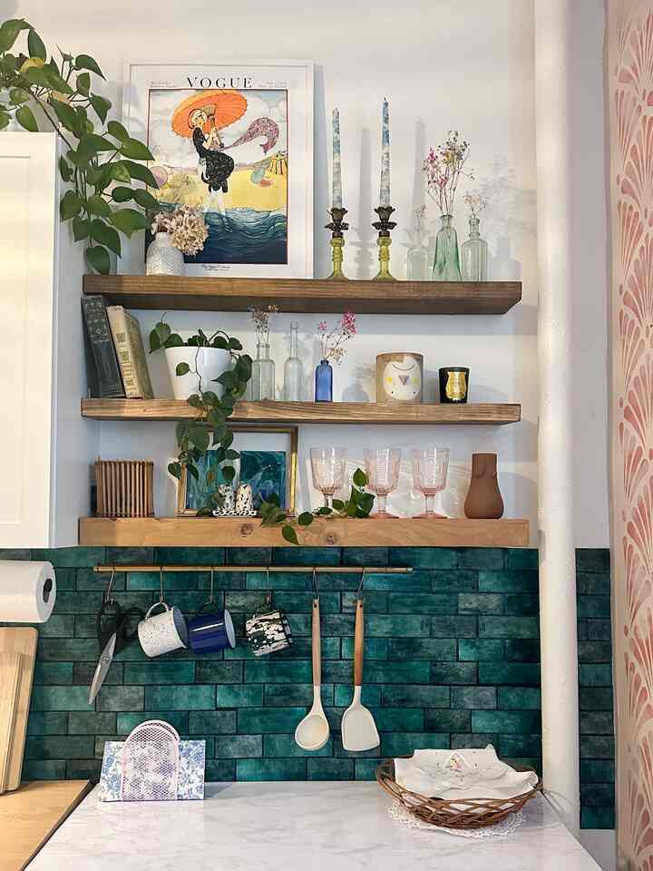 I love my little eating nook! The backsplash is actually a vinyl sticker, a ~must~ in rental living. I love displaying all my beloved objects too. 
#kitcheninterior #diningtable #maximalist #colorfulinterior #whimsical  