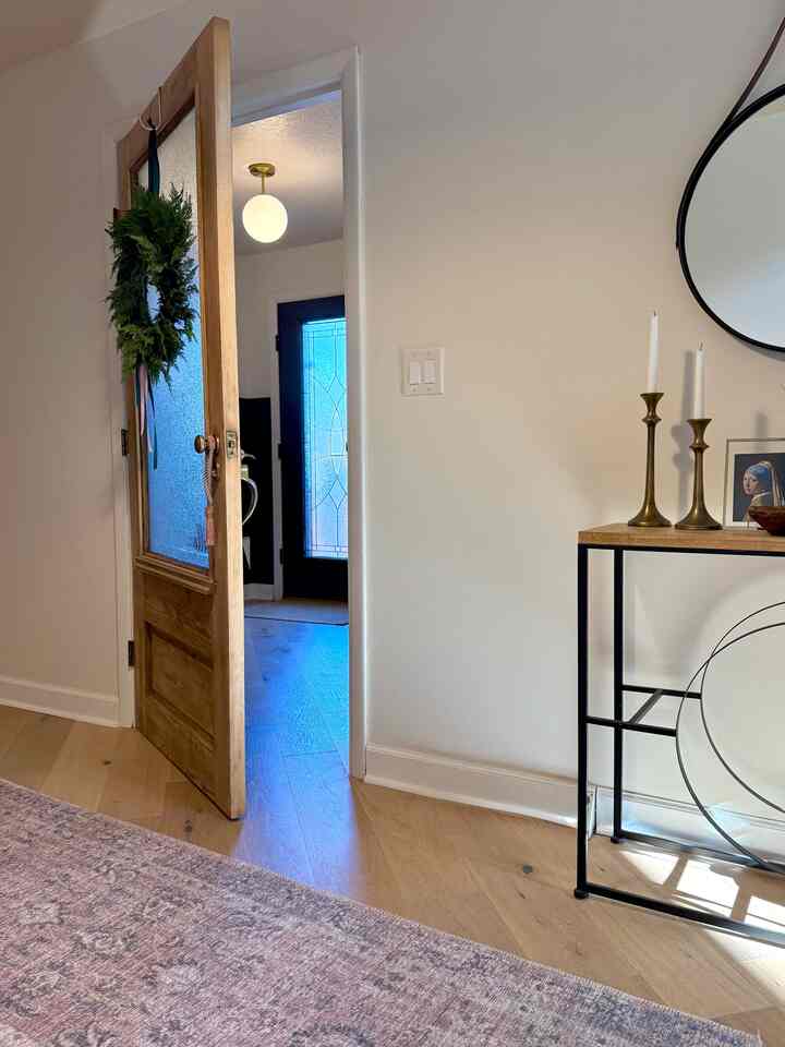 I have a door that separates the hallway from the entrance. I upcycled an old door with glass to let in more natural light and create a sense of openness.
#enterance #hallway #warm #modern #glassdoor #wood #natural #diy