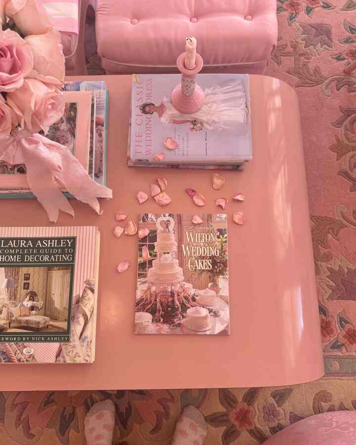 Vintage wedding cake books are the best coffee table accessories — I love flipping through these for inspiration 🦢💗🍰 #pink #livingroom #shabbychic #vintage #cake 