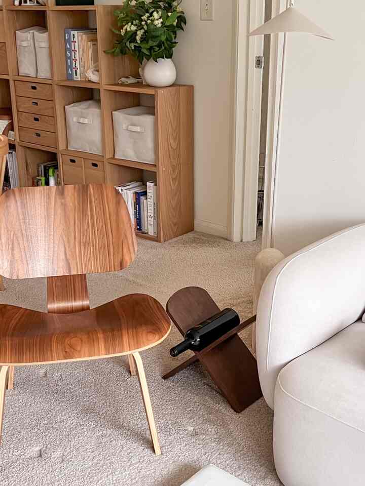 Our magazine rack is the definition of versatile. It once held wine bottles, and now it's home to baby books. Love that it blends in without disrupting the decor!

#magazinerack #woodenfurniture #WoodInterior #wood #beigeinterior #beigetone #beige 
