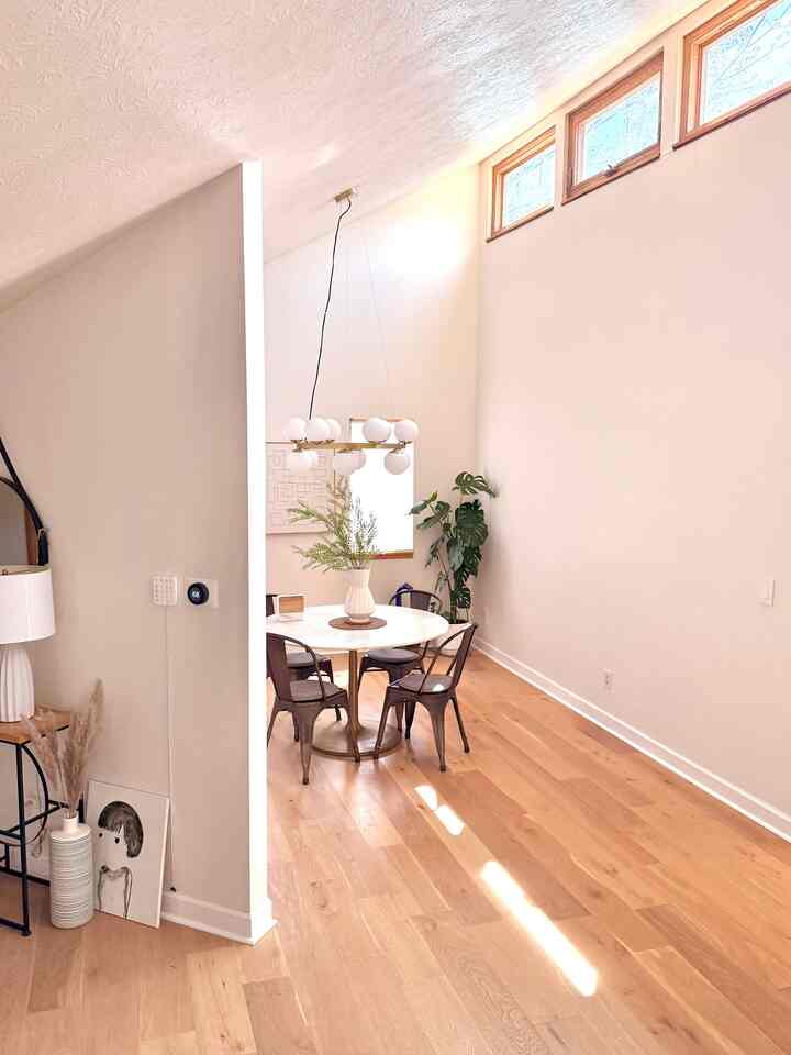 This angle showcases the unique architectural design of my house with high ceiling and windows.
#modern #diningroom #marbletable #warm #natural #ceiling 