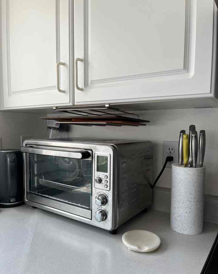 Keeping the kitchen organized is all about simple solutions! ✨ This chrome under-cabinet rack and knife holder have been such space savers — functional and sleek. #kitchenorganization #spacesaving #chromedecor #kitchengoals #minimalistkitchen #organizationinspo #kitchenstorage #modernhome #simpleliving #kitchendesign #homeaesthetic #kitcheninspo #cleankitchen