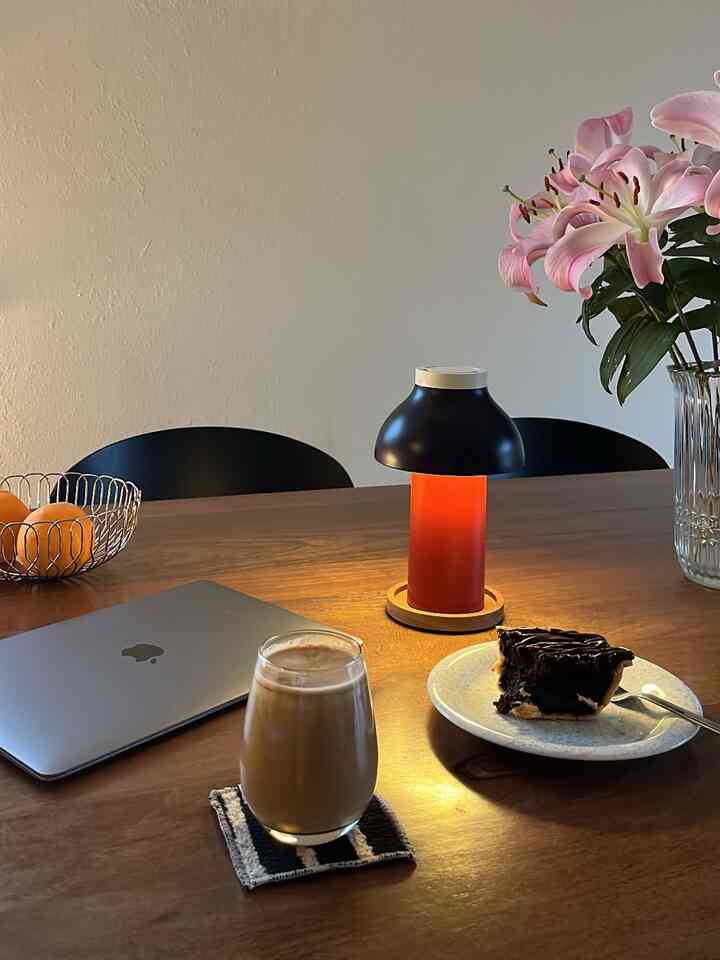 Enjoying a soy latte, while working from home on a rainy day. I feel so good. ☺️🤎

#diningtable #lamp #basket 