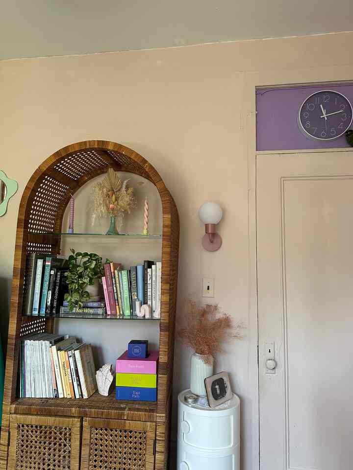 One of my favorite vintage items I own is this 70’s rattan hutch! So stylish and provides great storage. 
#livingroom #vintage #vintagedecor #colorful #maximalist 