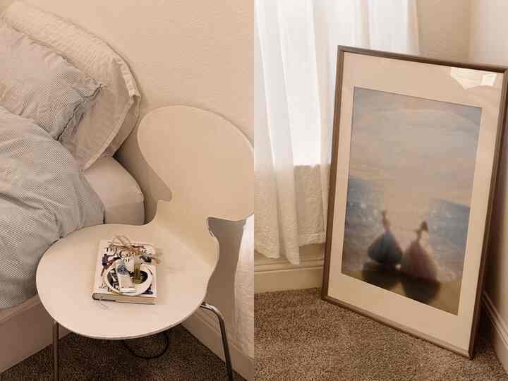 White and beige toned bedroom corner featuring a duvet cover and an armchair, creating a cozy and natural atmosphere