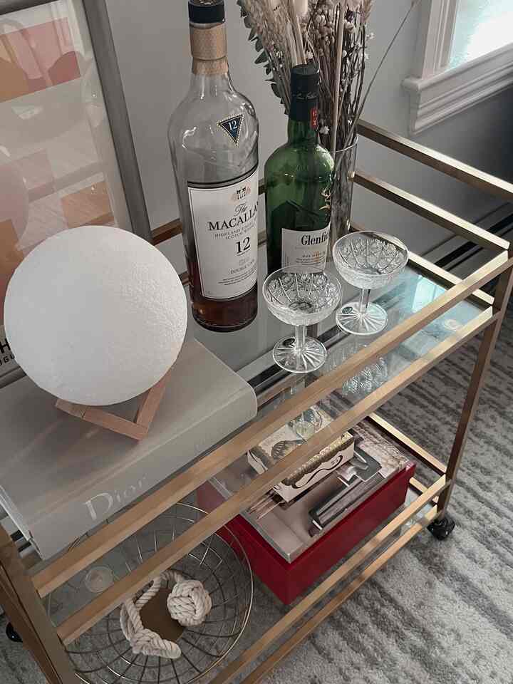 Bar cart styling in progress… how’d I do? #Bar #BarCartGlowUp #StyledSpaces