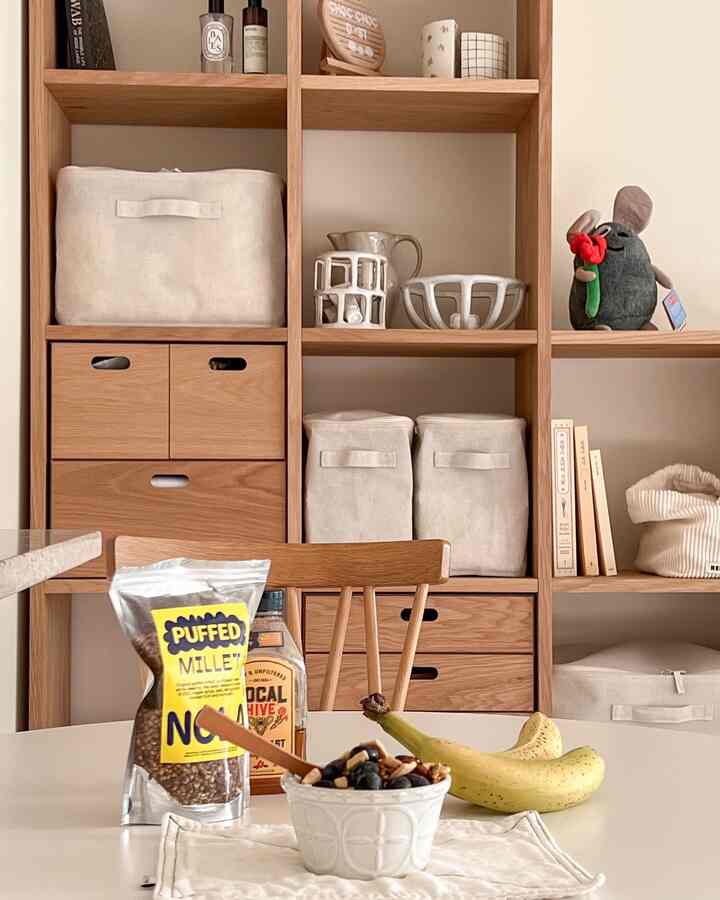 Eating diligently!💛🤎🤍

#livingroominterior #muji #storageorganization #storageinterior #woodenfurniture #WoodInterior 