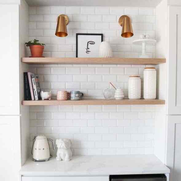 Styling these kitchen shelves with books, mugs, and decorative items #openshelving #kitchendesign #decorinspiration