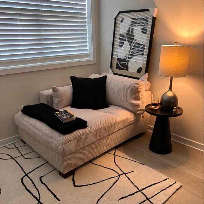 Finally got a spot to actually read in.  It's not perfect, but it's mine.  And the lamp is key for late-night reading sessions plus cozying up on this beige sofa. #readingnook #realhome #interiordecor #livedin #cozy #lamp #sofa