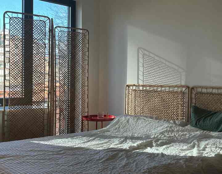 Looking back on our bedroom from our place. 

#rattanheadboard #rattandecor #summerbedding #bedroominterior 