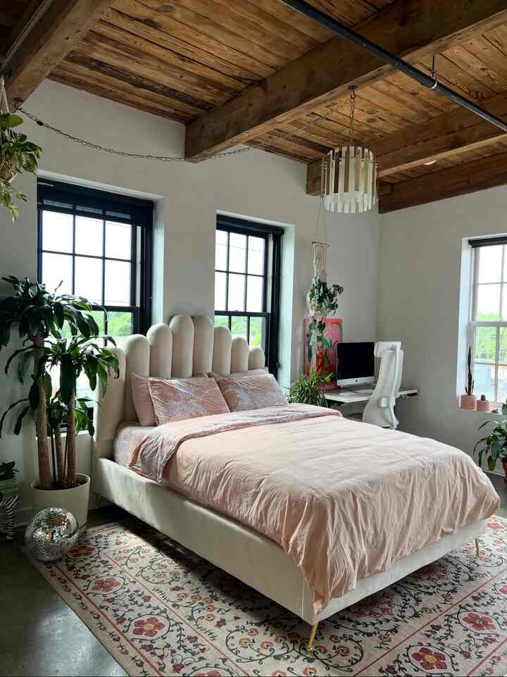 Cozy vibes only in this dreamy bedroom retreat! ✨ Love the natural light and touches of green. 🌿 #BedroomGoals #InteriorDesign #CozyHome #PlantLover #HomeDecor 
