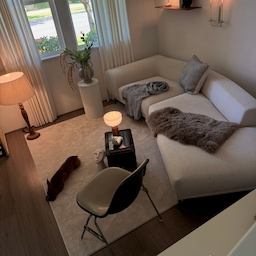 Curtains add a cozy touch to the space.
#livingroom #livingroomdecor #Curtains #livingroominterior #rug #vintagechair #stool #vitra #pedestal #wallmirror #shelf #shelfdecor #lamp #lighting #lightinginterior #moodlighting #artificialflower #vase #sofa #couch #blanket #cushion #curtain #falldecor #fallinterior 

