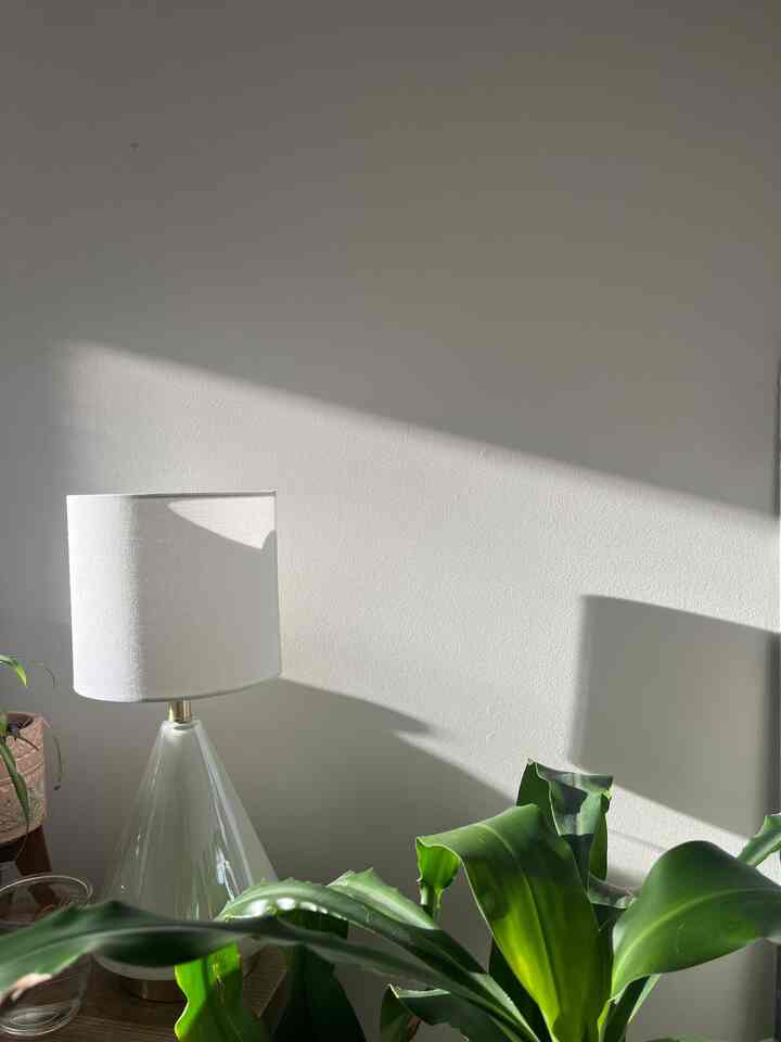 the morning sun #bedroom #nightstand #bedsidetable #bedroominterior #bedroomheadwallinterior #tablelamp 
