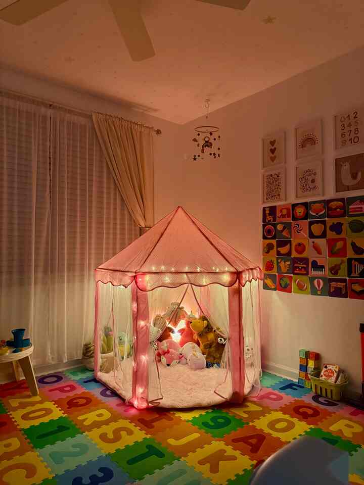 My husband’s work gifted our daughter the cutest birthday present — a princess castle playhouse tent! 👑

We decorated it with string lights and all her favorite stuffed animals, and she’s absolutely in love. 

We’ve been spending every night after bath time playing, reading, and winding down together inside her little castle 🩷

Such a thoughtful and special gift — thank you so much! ✨

#nursery #nurseryinterior #nurserydecoration #nurseryfurniture #babyroomdecoration #babymat #babyroominterior #baby #babyroom #playroom #cozy #cozyhome #cozyinterior 