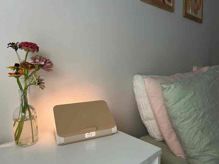 my newest bedroom find! this clock has a speaker built in, an alarm, dimmable light, and phone charger #bedroom #nightstand #clock #alarmclock #bedroomdecor #decor 