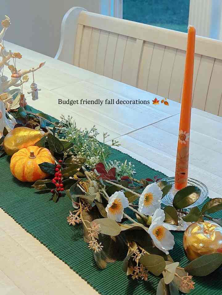 put together our Thanksgiving table with a little bit of everything I love —
leaves gathered from our yard, some dried petals I already had, the ceramic Thanksgiving tree my mother-in-law gifted me, the deep orange candles my sister gave me, and the acorns the boys picked up. 🦃🤎


#holidayhosting #gatherandglow #friendsgiving #thanksgivingdecor #cozyhome #autumndecor #farmhouse #cottage #patio #cozydecor 