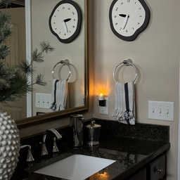 I love a touch of modern whimsy in a traditional bathroom. 
#bathroom #clock #modern #traditional #transitional #whimsy #ohousetoday
