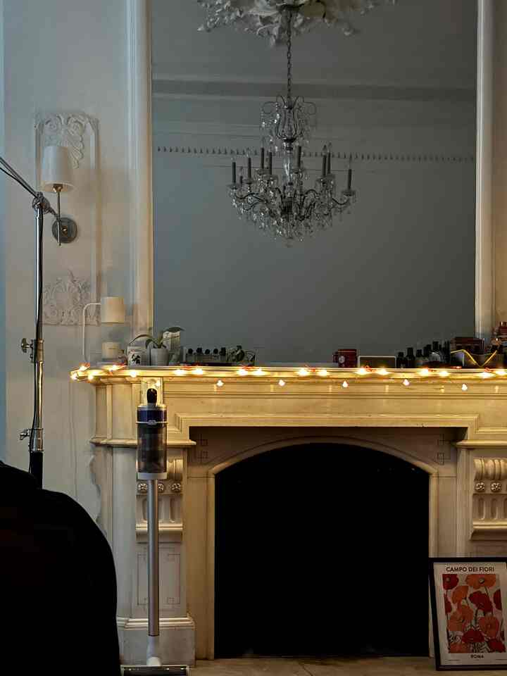 Early mornings with holiday fairy lights #OhouseGlow #cozycorner #fireplace #holidaylights 