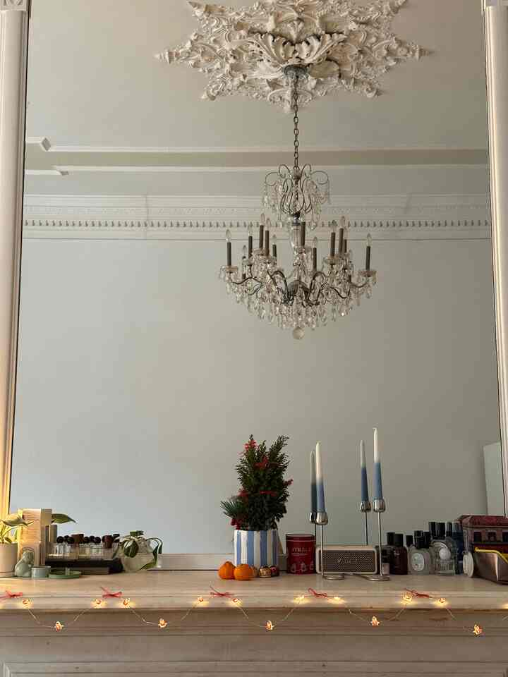 A little holiday festivities and morning coffee & croffle #holidayseason #christmasdecor #fireplace #mantle #perfumes #morningcoffee #croffle #minioven