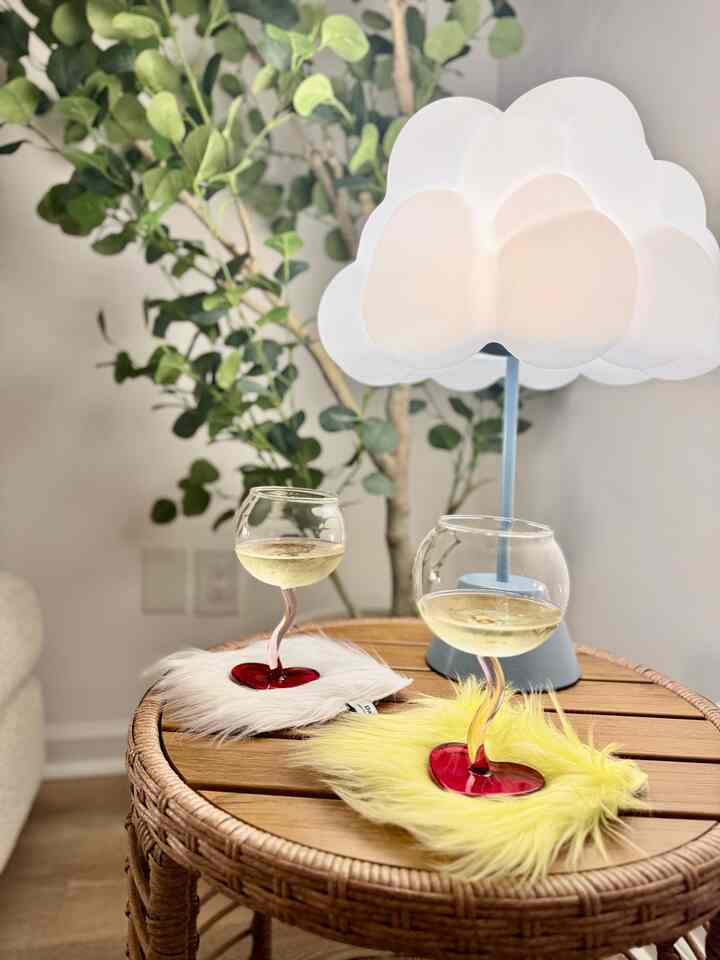 Little details like these faux fur coasters from Ohouse make everyday moments feel special 🍷🤍

Perfect for cozy nights at home. 🥂✨

 #OhouseLight #OhouseCozy #OhouseStyling #OhouseGlow #cozy #cozyhome #cozyinterior #cloudlamp #fuffycoasters #wineglass #livingroom #livingroominterior #cozylivingroom 