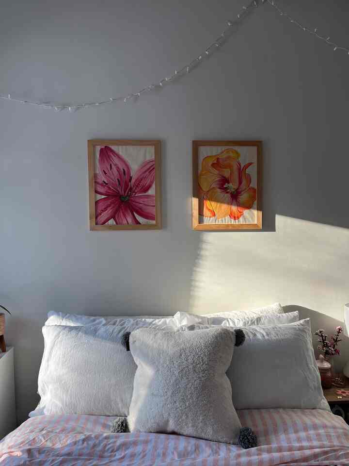 can never have too many pillows #bedroom #bedsheets #duvetcover #strippedduvetcover #pictureframes #frames #bedroominspo