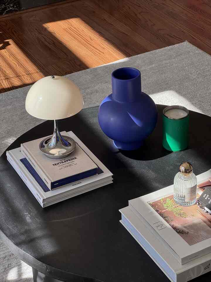 This & an uplifting playlist to get through the day✨
.
.
.
#vase #livingroominspo #portablelamp #lamp #coffeetablesetting #mcm #ecclecticdecor #coffeetablebook