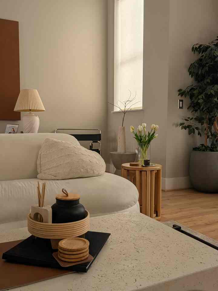 Neutral doesn't mean lifeless-it means timeless. Rooted in wood, softened by earth tones. #stone #wood #livingroom