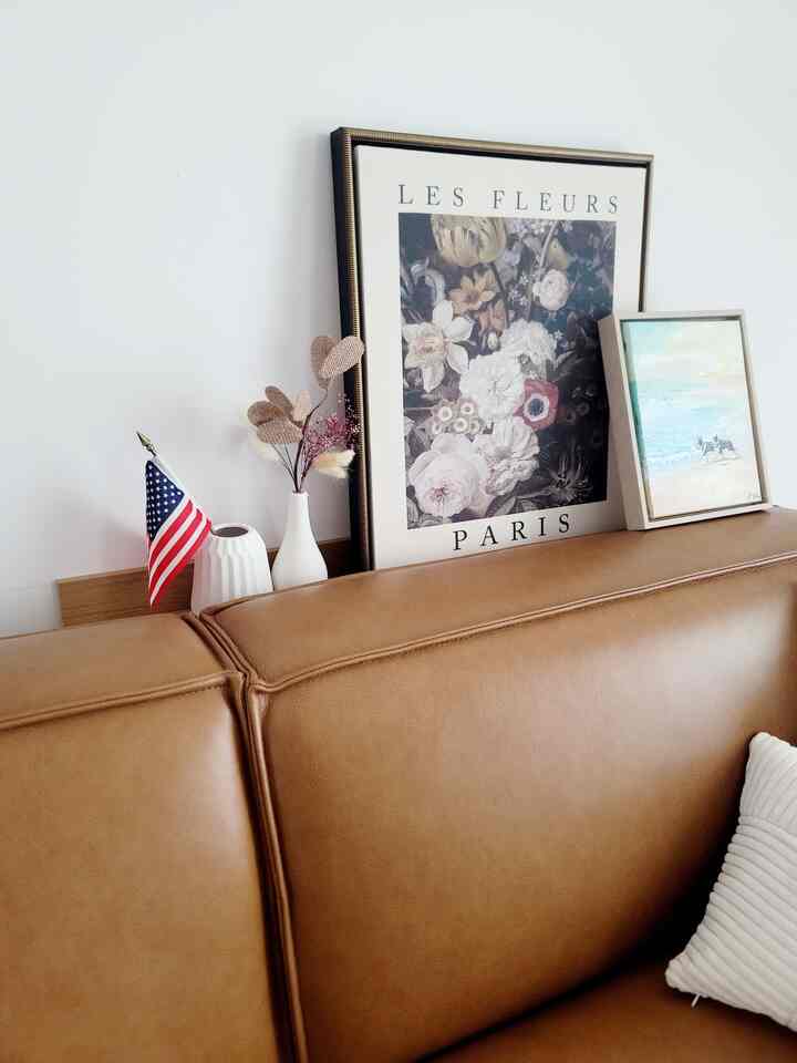 Mini flag decorations of July 4th 

A little nod to Independence Day right above our cozy couch — with florals, calm art, and a mini flag standing proud.
Sometimes, the smallest touches carry the most meaning.
 #July4thDecor #July4Vibes #FourthDecor #IndependenceVibes #FestiveAtHome #July4thReady
