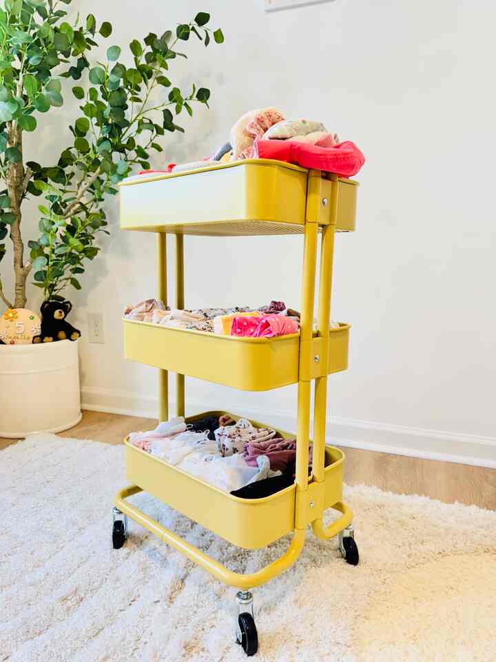 Turning chaos into cuteness with this sunny little hack! I used IKEA’s yellow utility cart to organize my baby’s spring and summer clothes, and it’s a total game changer. Easy to roll, easy on the eyes, and the perfect pop of color to brighten up her room. Who says organization can’t be fun and adorable? 

#ikea #ikeatroli #ikeafurniture #organize #organization #Organizingclothes #spring #cleaning #clothesstorage #baby #babyroom #organizedstorage #storageshelf