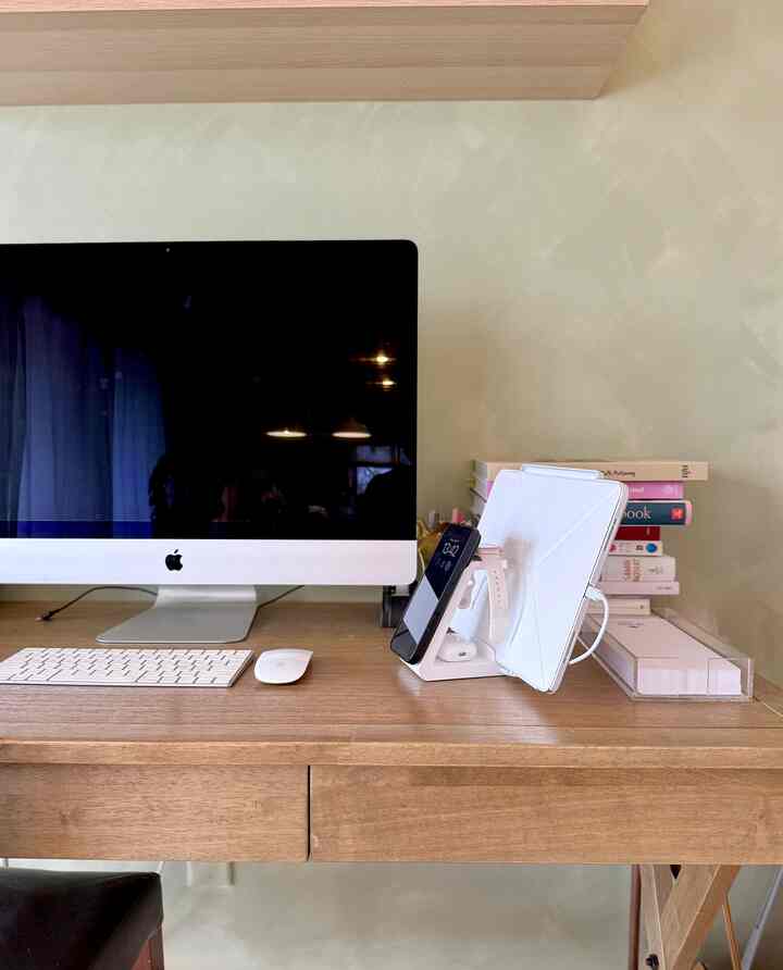 I enjoy organizing my workspace. This charging station conveniently holds and charges my iPad, AirPods, Apple Watch, and iPhone, keeping my desk clutter-free. 
#desk #workspace #homeoffice #functional #clean #organize 