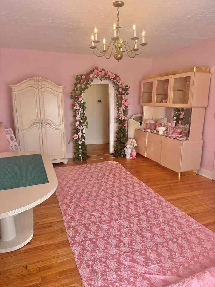 Measuring fabric in my dining room that doubles as my sewing/craft studio 🎀 still figuring out the furniture direction for this room… #pink #shabbychic #hutch #cabinet #diningtable 