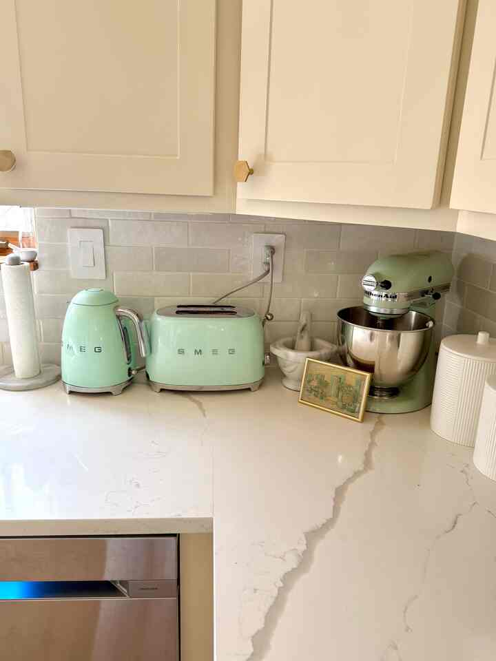 My kitchen has limited colors, including mint green, cream white, brass, and marbles. 
#kitchen #color #marble #brass #mint #appliance #modern #natural #warm 