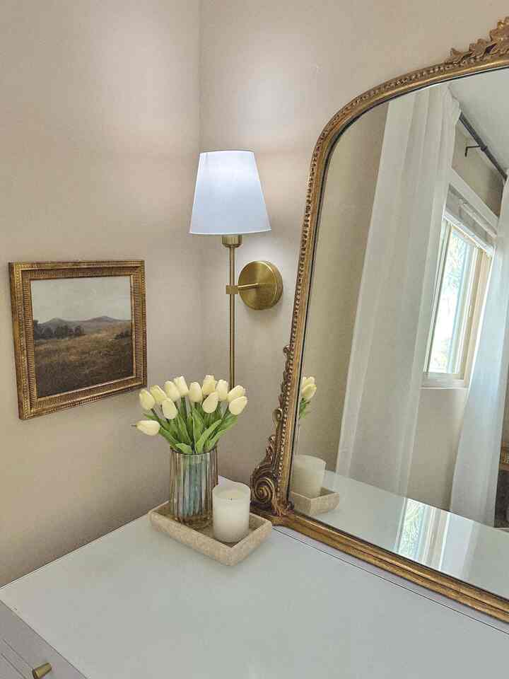 Added these wall sconces to my vanity for extra light. They have rechargeable light bulbs so there is no hardwiring required! #wallsconce #vintageart #wallart #lighting 