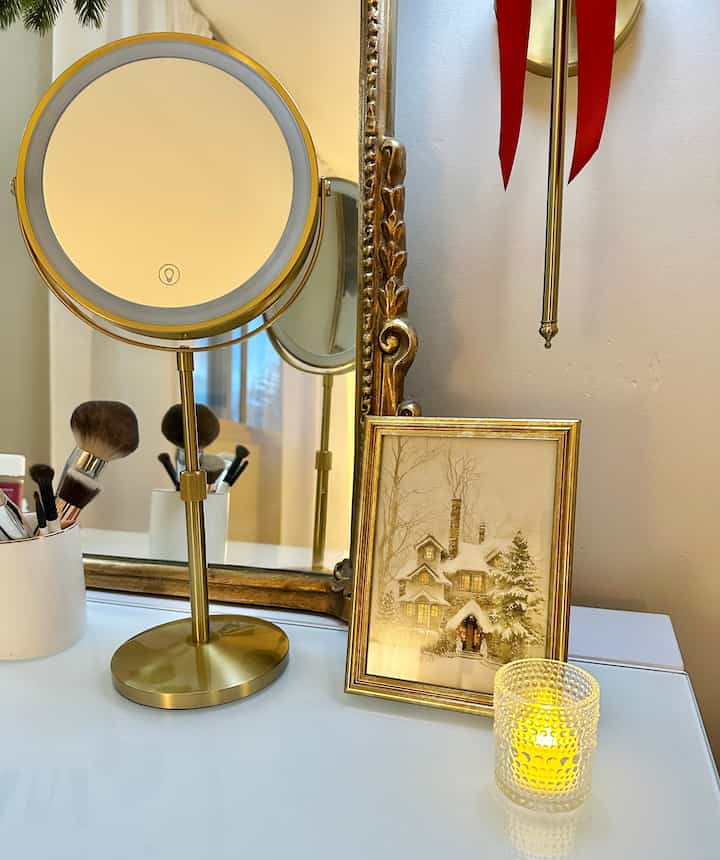 Finding seasonal prints off of Etsy are an easy and affordable way to decorate! #etsy #winterprint #artwork #candle #votivecandle #mirror 