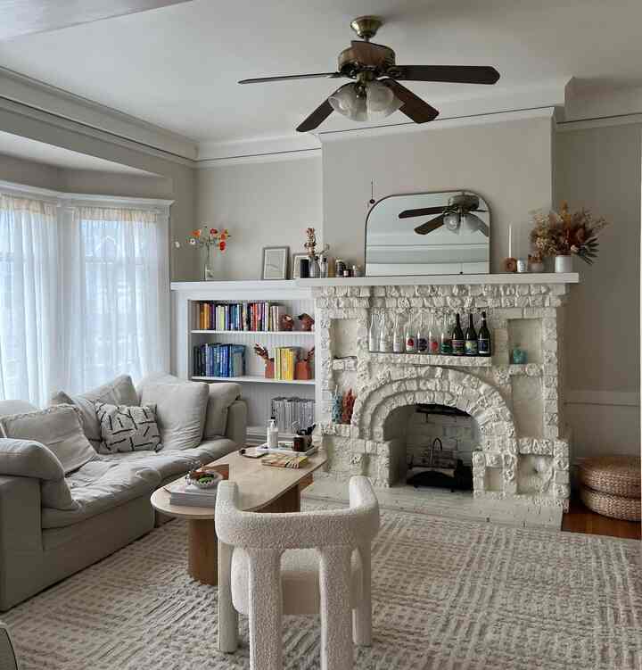 <span data-sheets-root="1" style="color: rgb(0, 0, 0); letter-spacing: normal; font-size: 10pt; font-family: Arial;">white living room filled w textures and pops of color #couch #whitesofa</span>