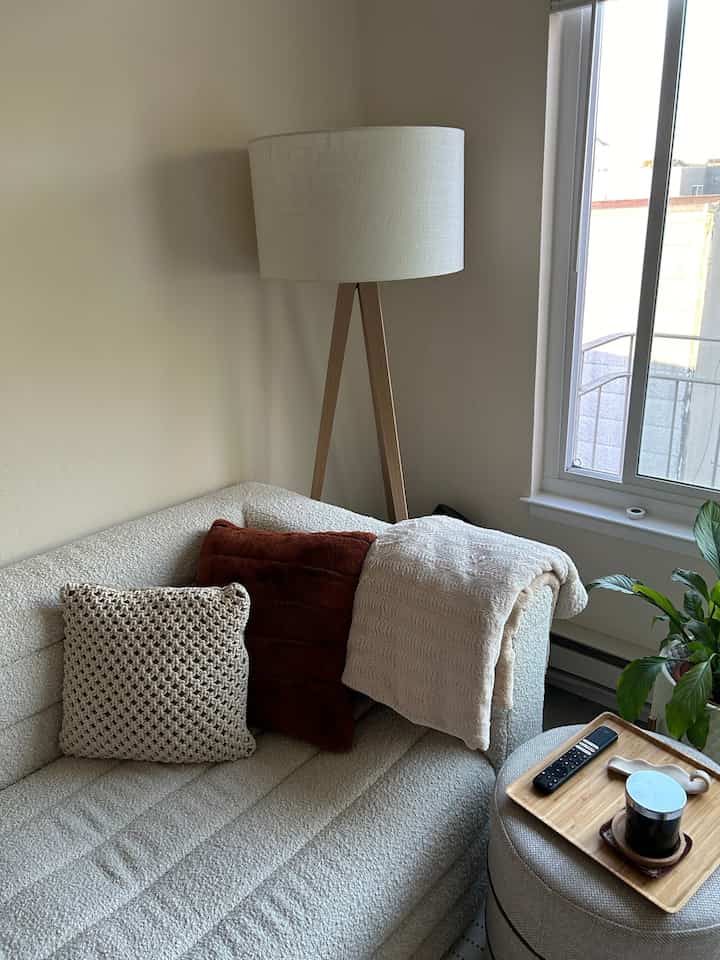 My favorite reading spot in my Japandi and MCM room 📖 #livingroom #naturallight #japandi #MCM