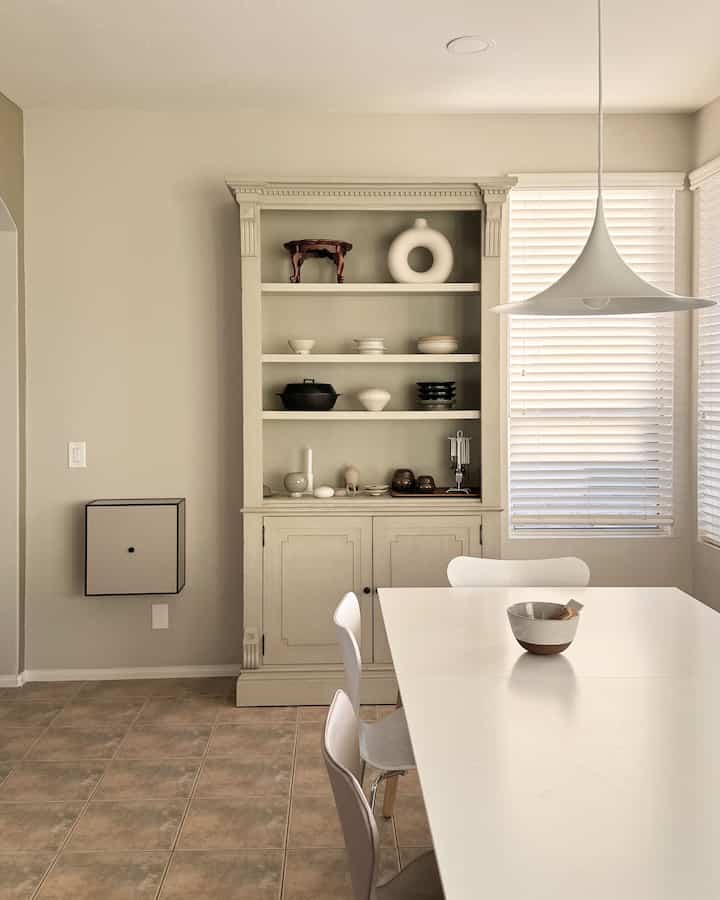 One of my favorite rooms in our home. #diningroom #neutral #diningroominterior #diningspace #shelfcabinet #shelfdecoration #ceramics