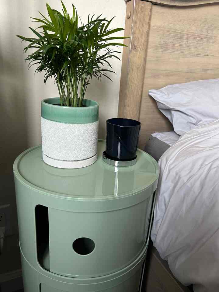 One of my favorite features is how it combines style and practicality, keeping all of my bedside essentials neatly tucked away. #roundnightstandstorage