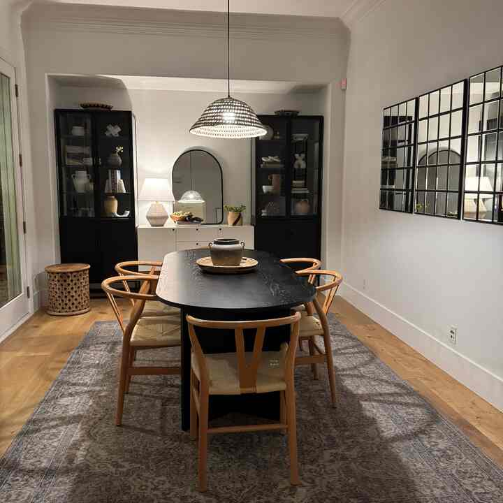 Moody, neutral dining room. #diningroom #moderndiningroom #interiormirror #diningroomdesign