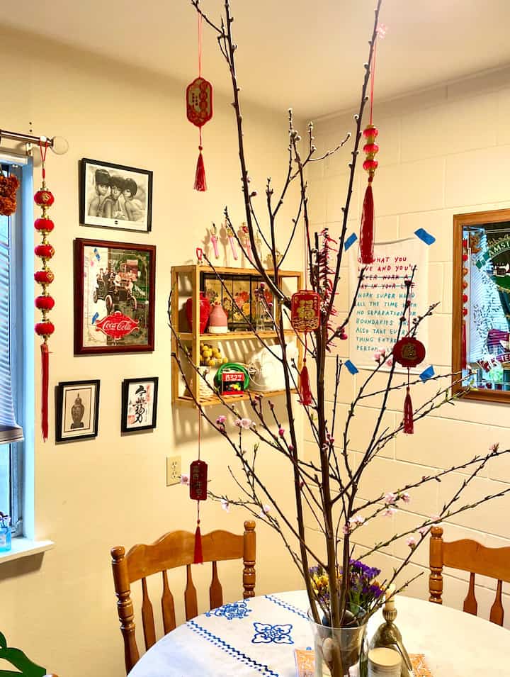 Huge plum blossom branch hung with my lucky decorations is my centerpiece! #chinesenewyear