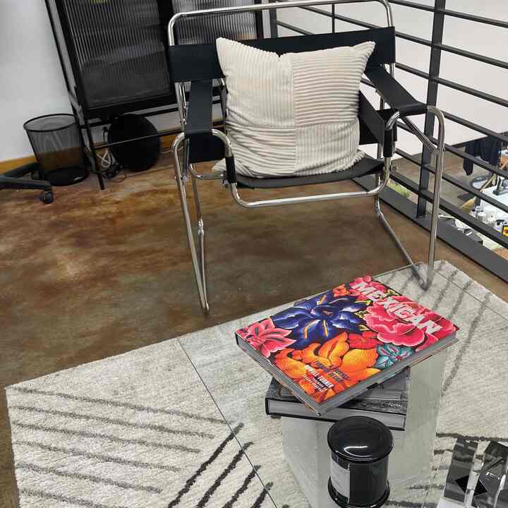 Cute waiting area for a loft #loft #waitingarea #seating #wassilychair